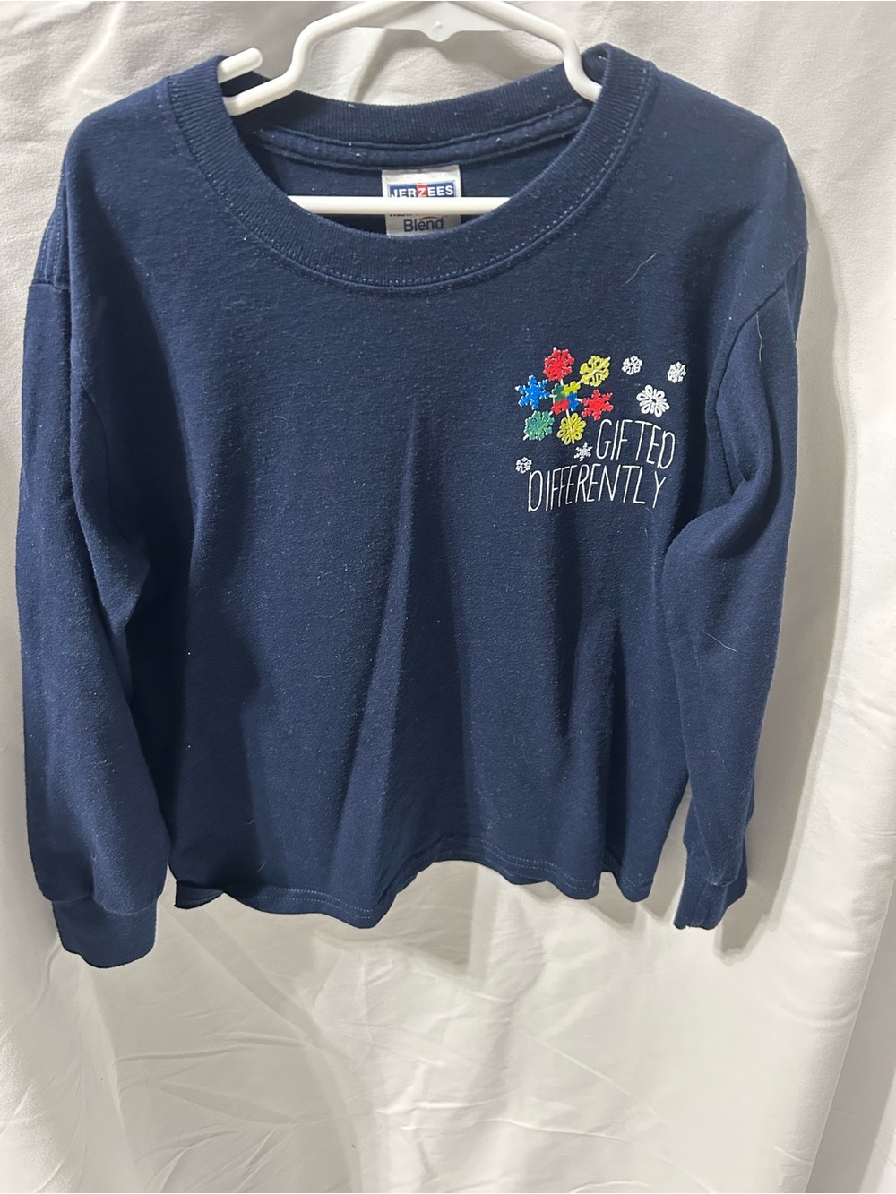 Jerzees Navy Kids Sweatshirt with Multicolor Puzzle Flower Graphic
